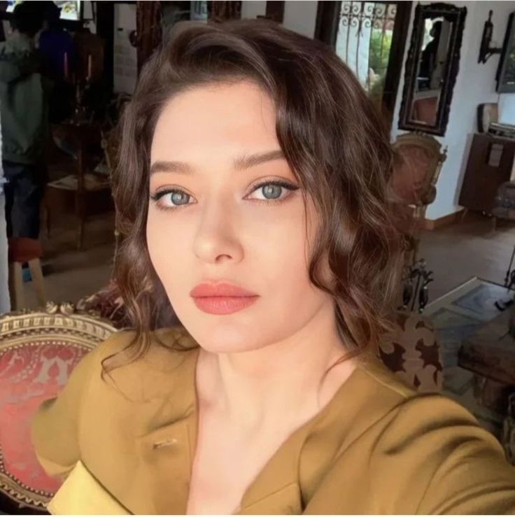 Nurgül Yeşilçay poses sex scenes