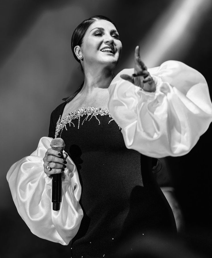 Sibel Can smiles nude