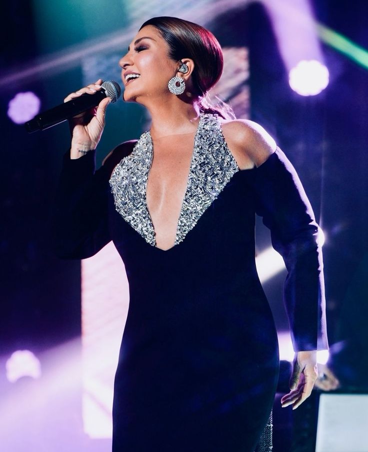 Sibel Can smiles sexy