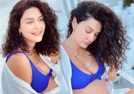 Bergüzar Korel smiles sexy