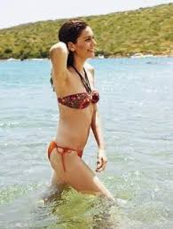 Bergüzar Korel smiles ass
