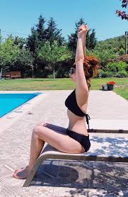 Nesrin Cavadzade smiles nude