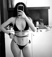 Hazar Ergüçlü smiles bikini