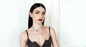 Hazar Ergüçlü smiles hot bikini