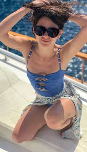 Nesrin Cavadzade poses sex scenes