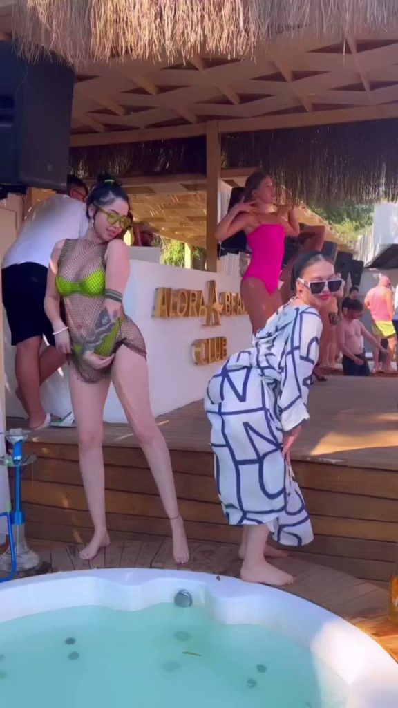 Esra Rabia smiles hot bikini