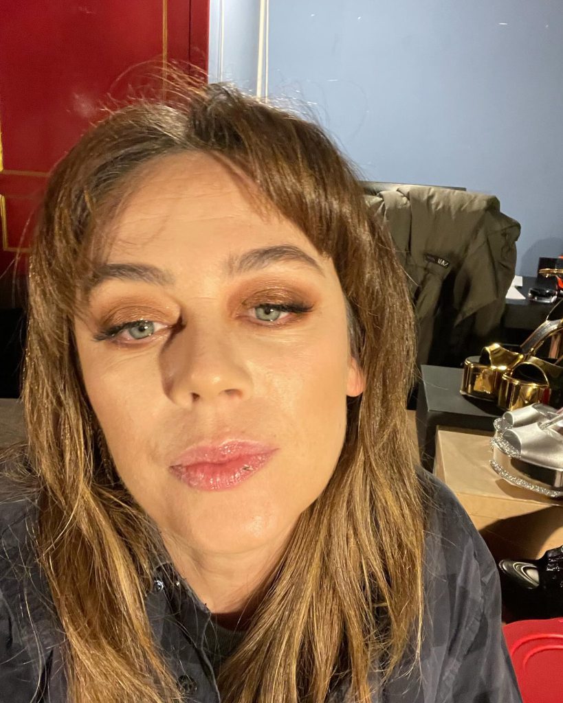 Demet Evgar smiles ass