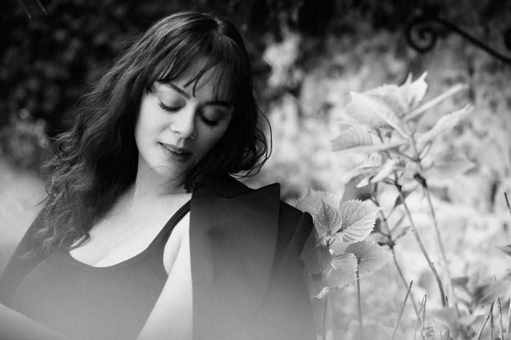 Demet Evgar smiles boobs