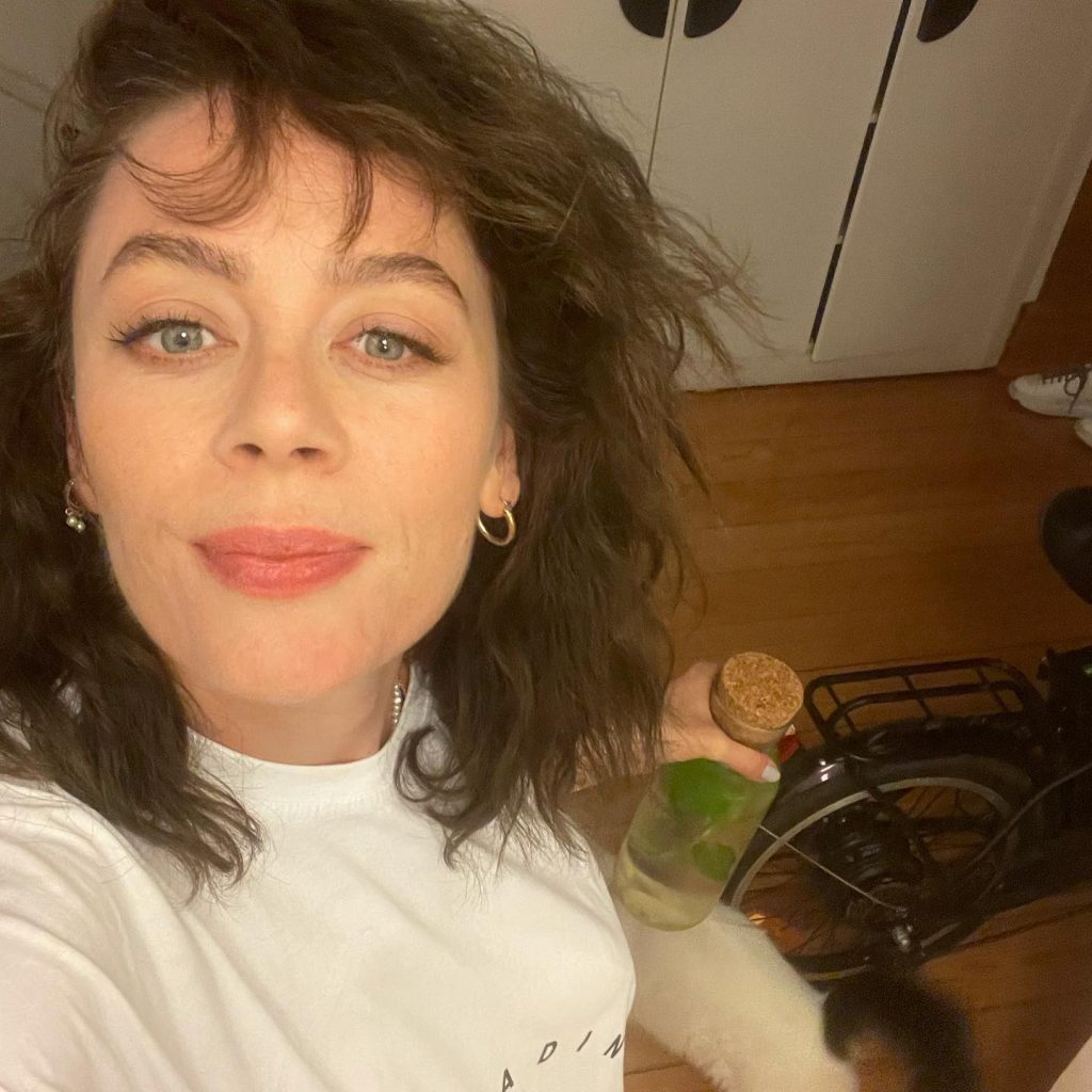 Demet Evgar smiles nude