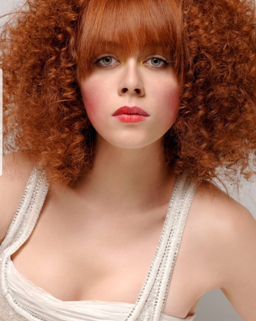 Demet Evgar smiles sexy