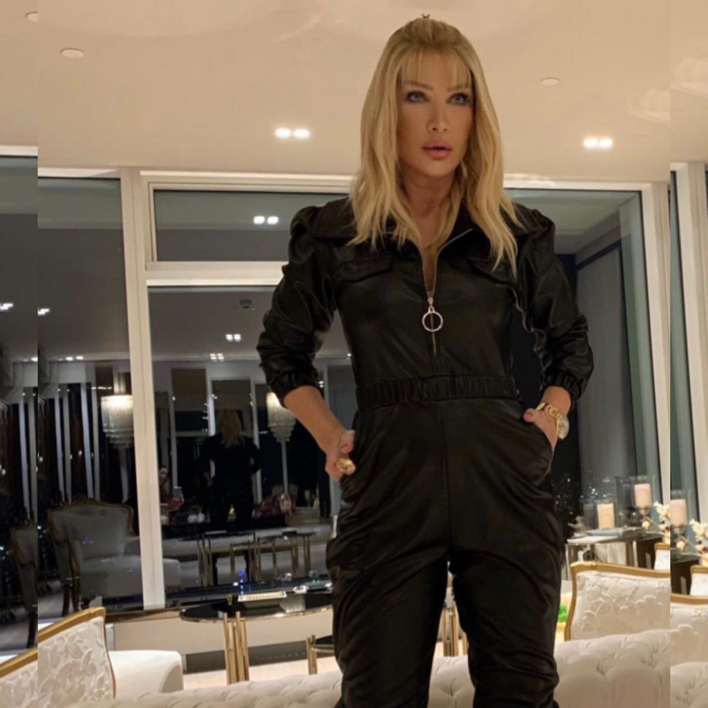 Seda Sayan depicts fire naked