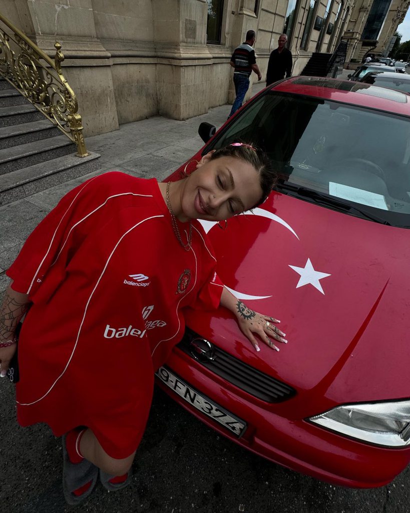 Alizade depicts fire nude