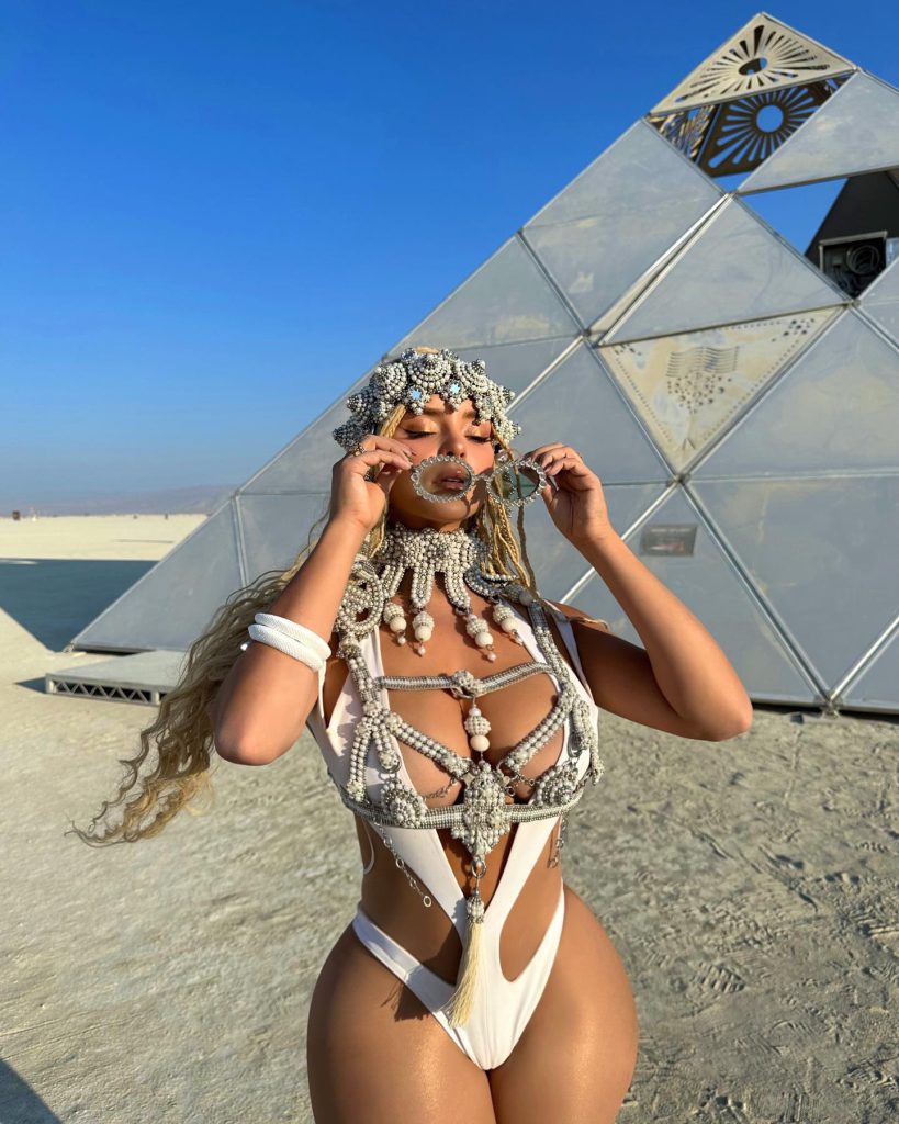 Demi Rose modeling naked