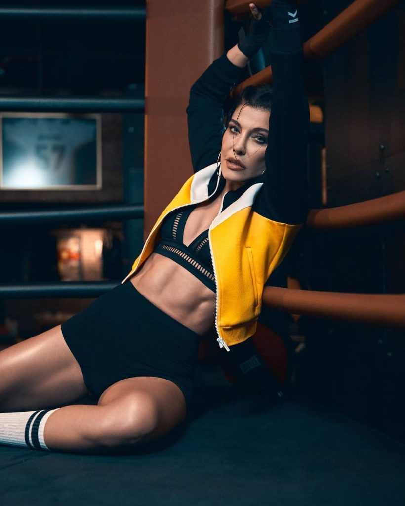 Deniz Akkaya depicts fire naked