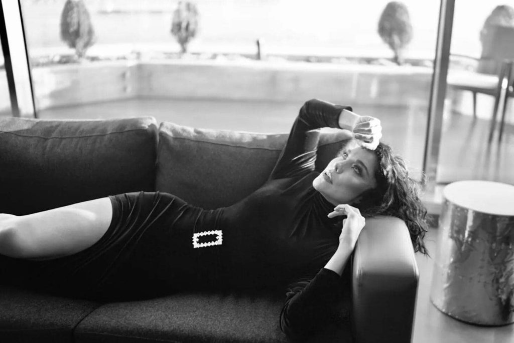 Deniz Akkaya smiles naked