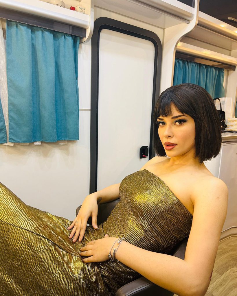 Devrim Özkan looks boobs