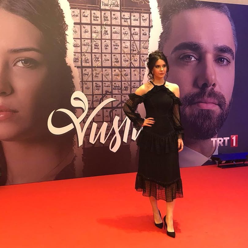 Devrim Özkan smiles naked