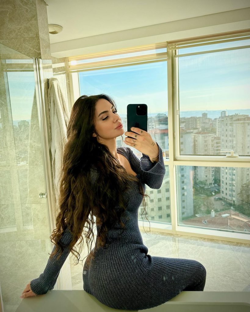 Ece Ronay depicts fire naked