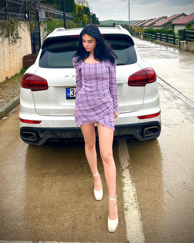 Ece Ronay smiles ass