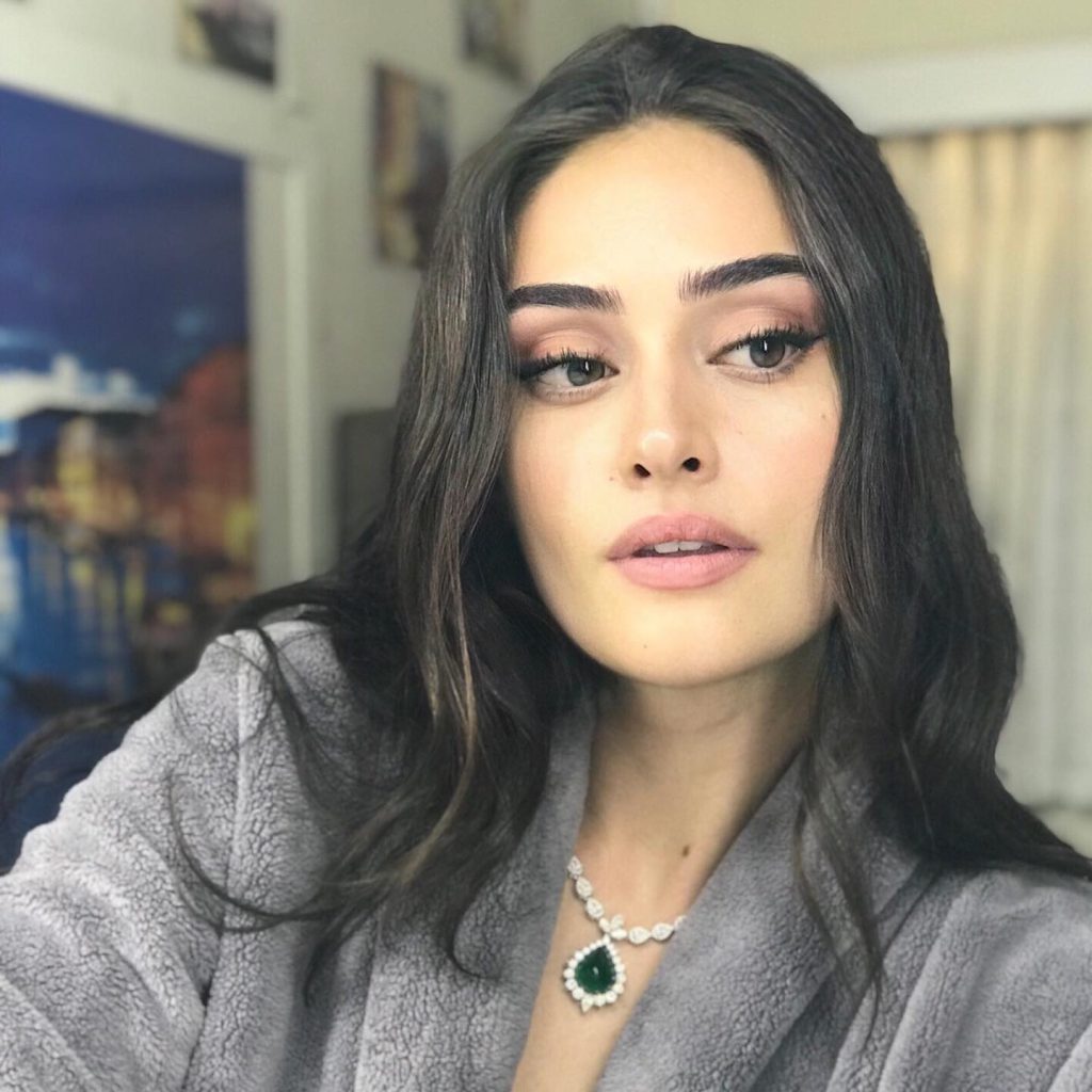 Esra Bilgiç depicts fire naked