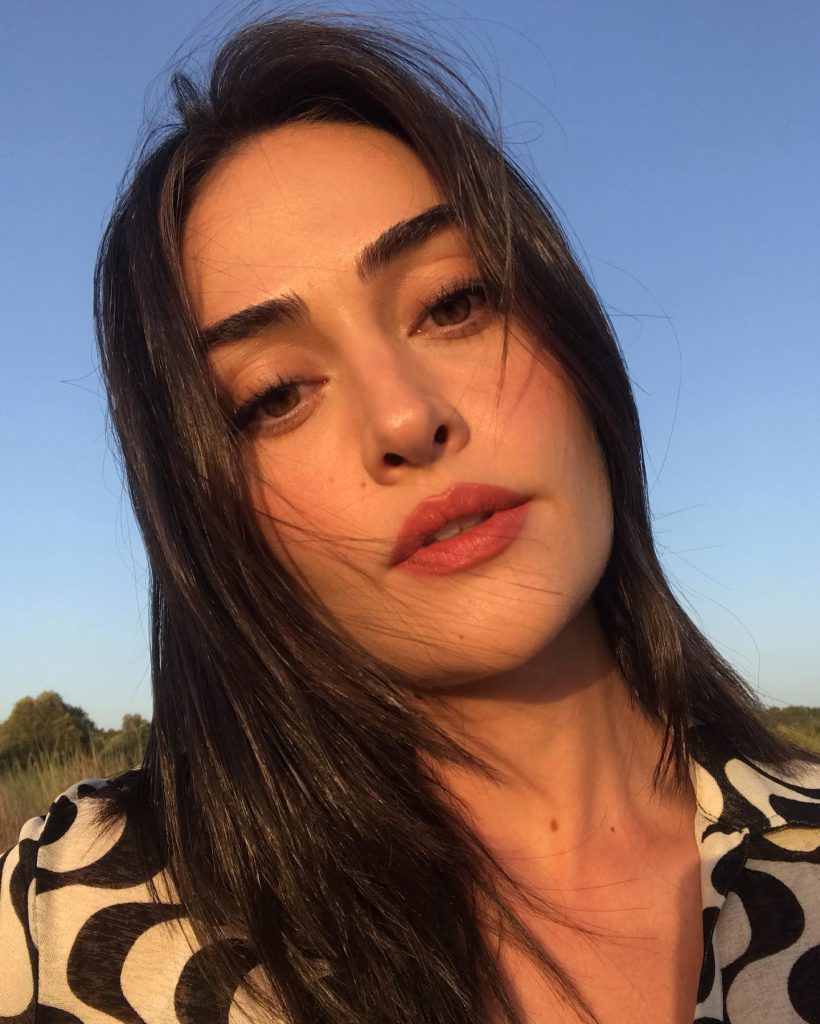 Esra Bilgiç smiles ass