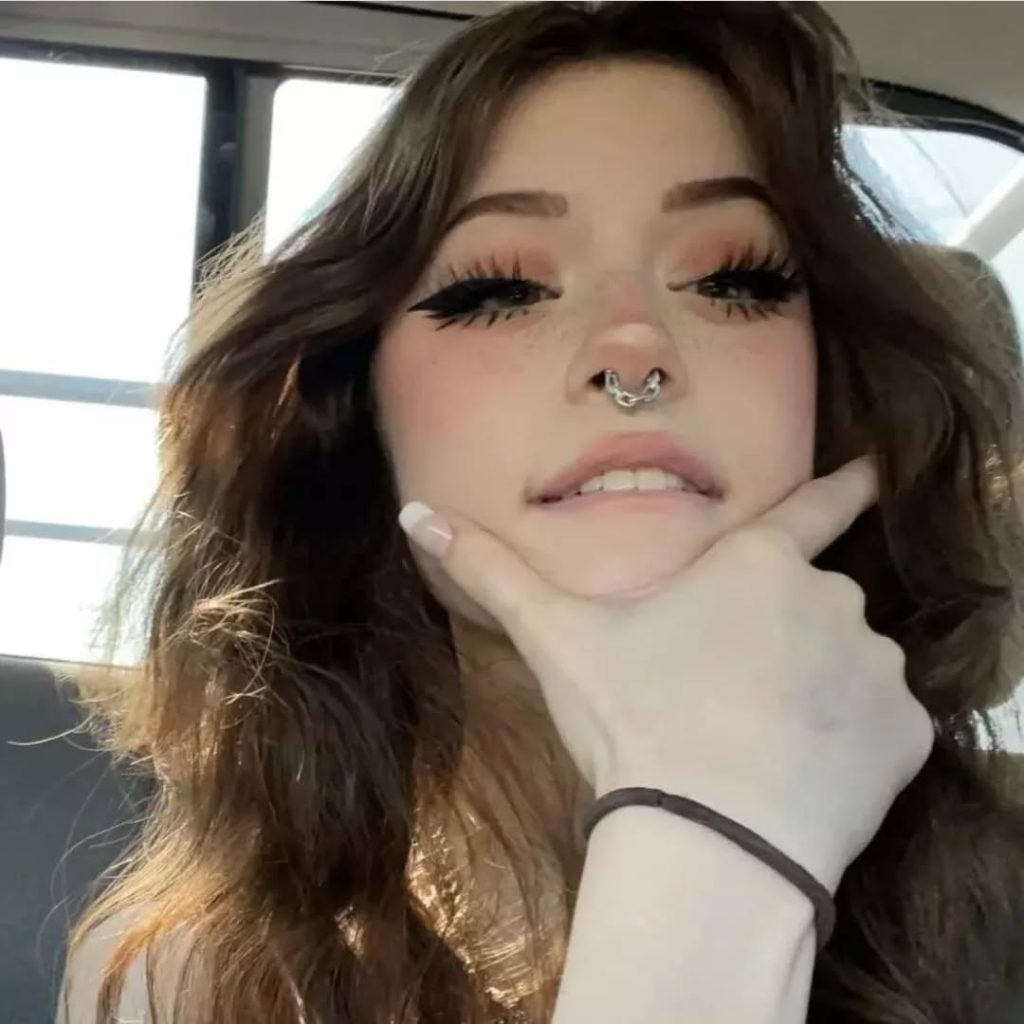 Hannah Owo depicts fire naked