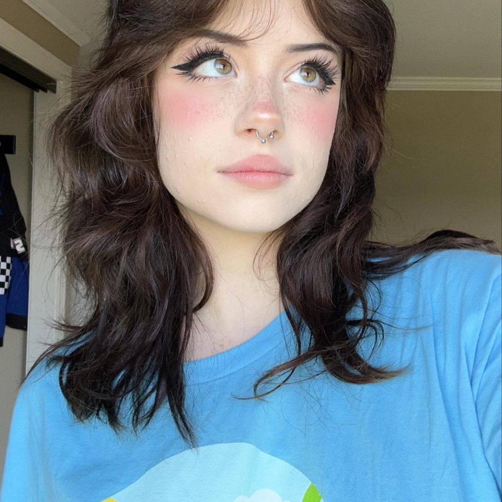 Hannah Owo smiles hot bikini