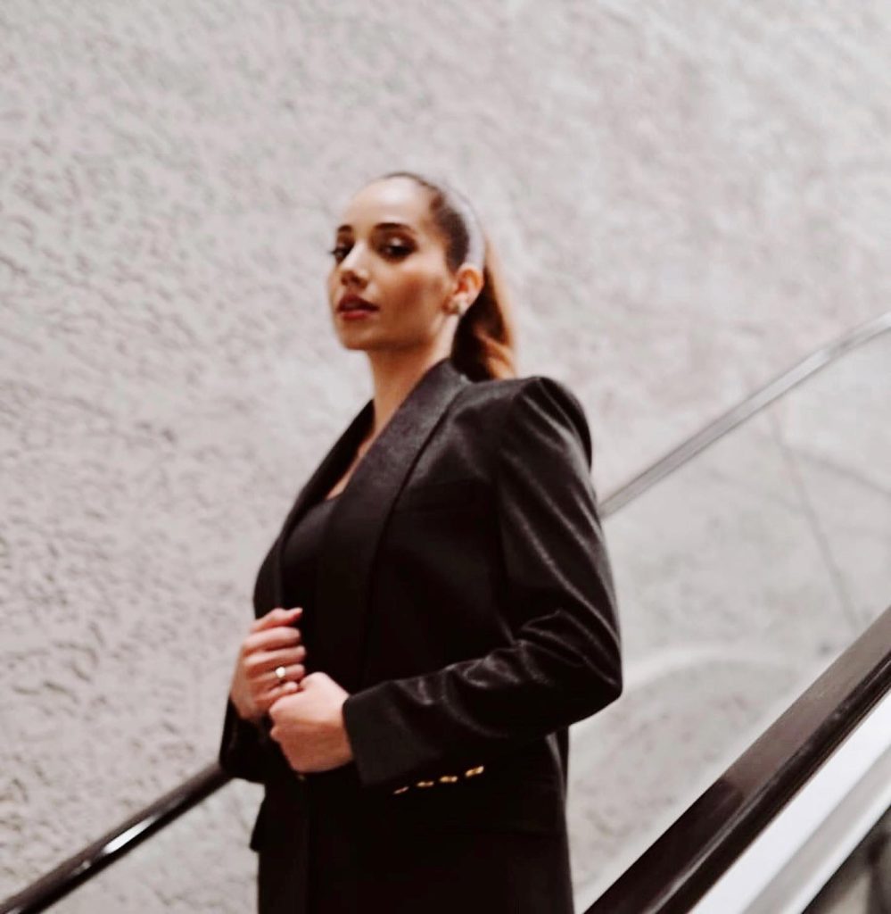 Özge Özacar poses ass