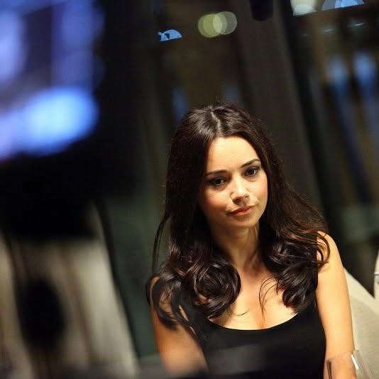 Özgü Namal smiles sexy