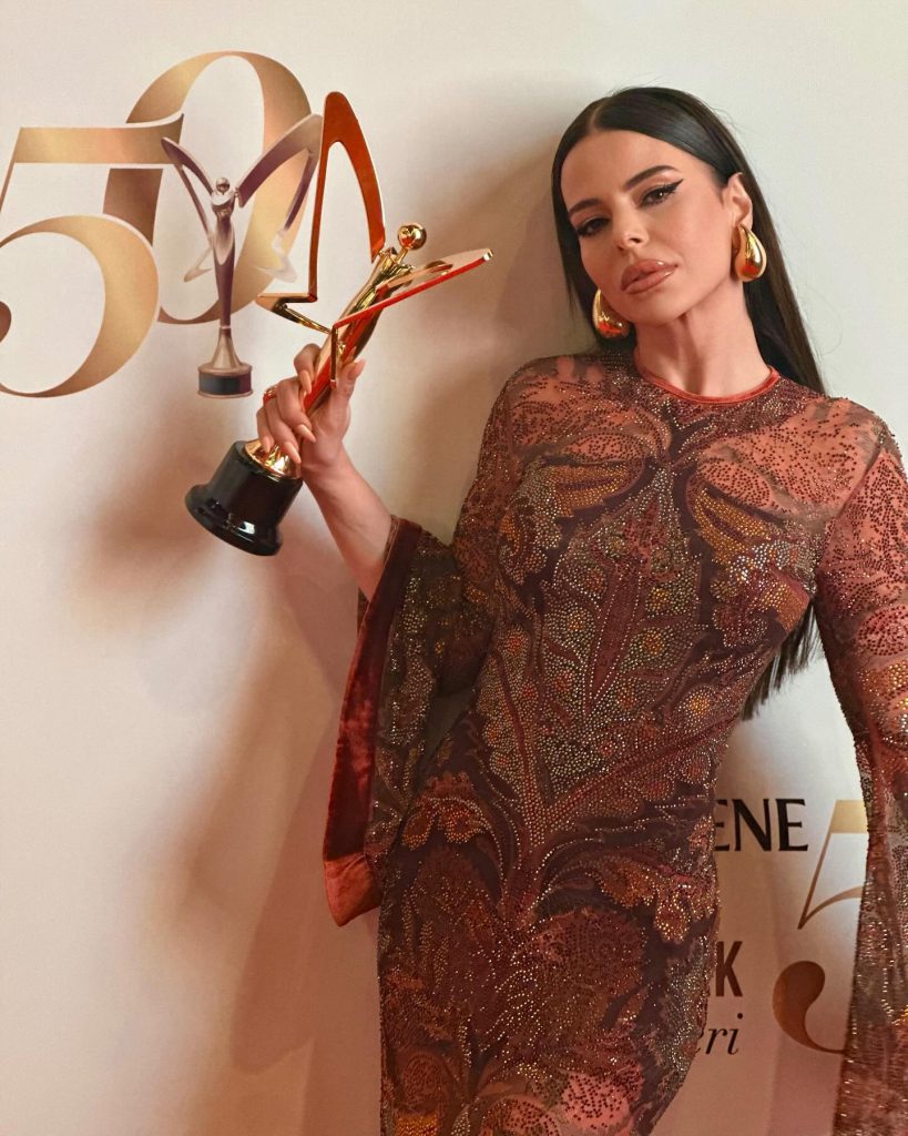 Simge depicts fire sex