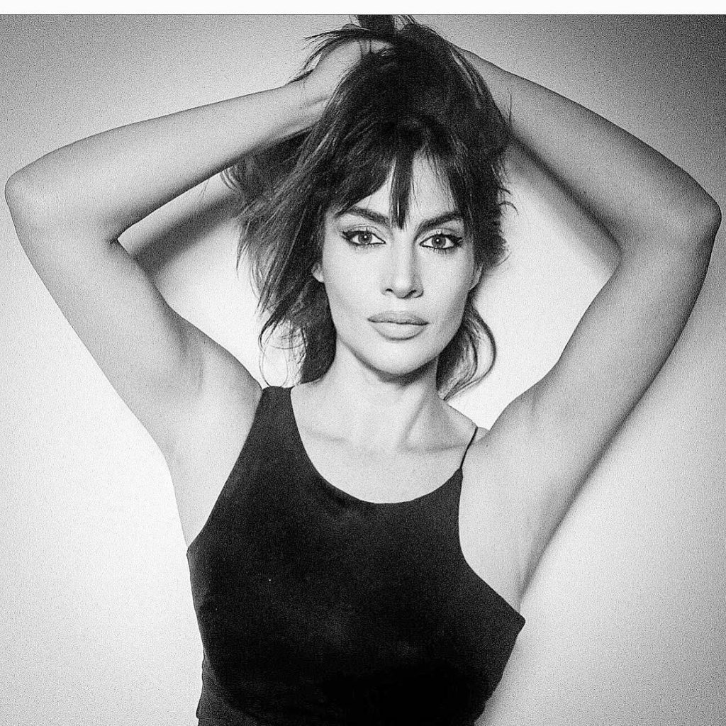 Tuğba Ekinci smiles sexy