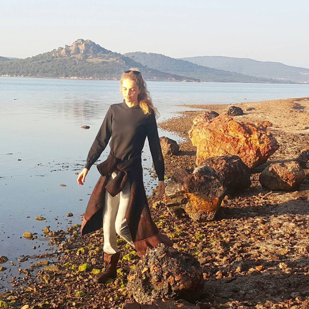 Tuğçe Kazaz depicts fire nude